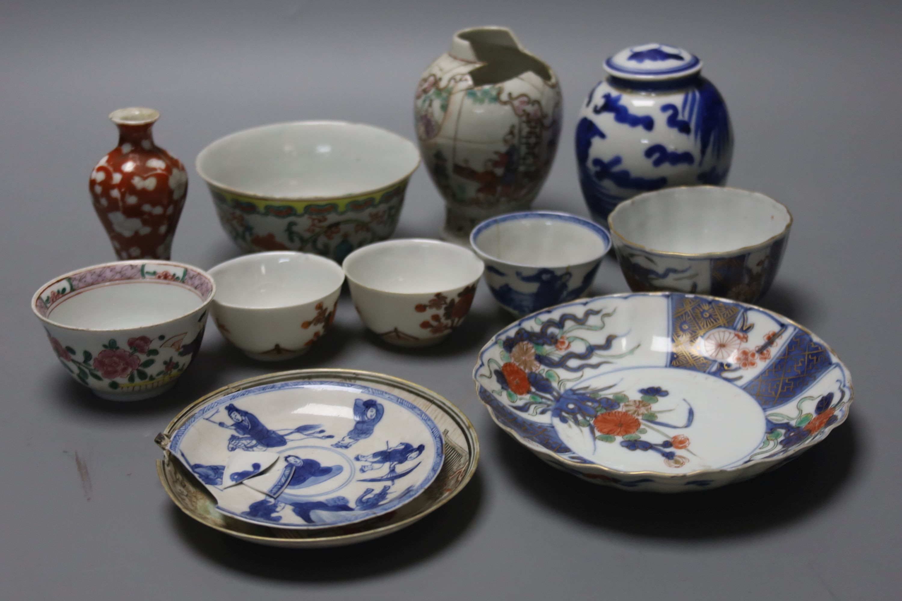 A group of Chinese enamelled porcelain vases and bowls, a similar blue-and-white jar and cover, 18th century and later
